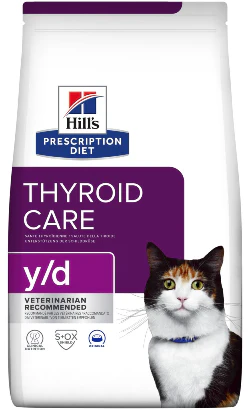Veterinarian holding a bag of prescription cat food